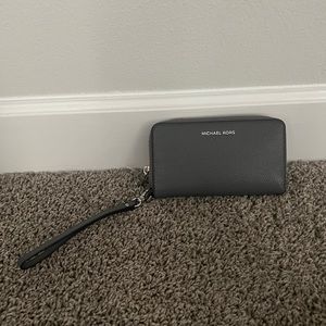 Small grey Michael Kors Wristlet